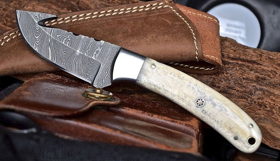 Damascus steel gut hook skinning knife