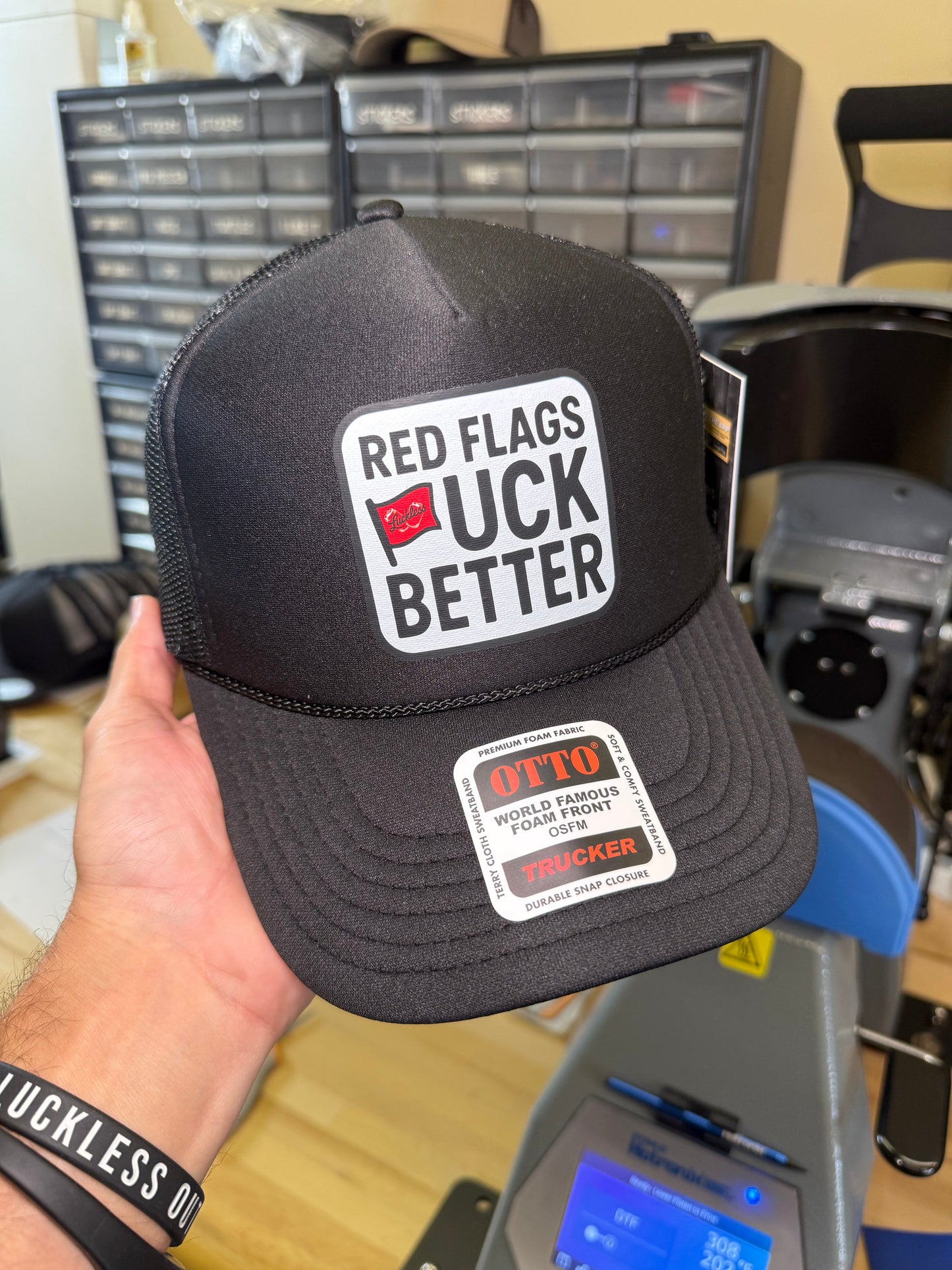 Red Flags F Better Trucker Hat