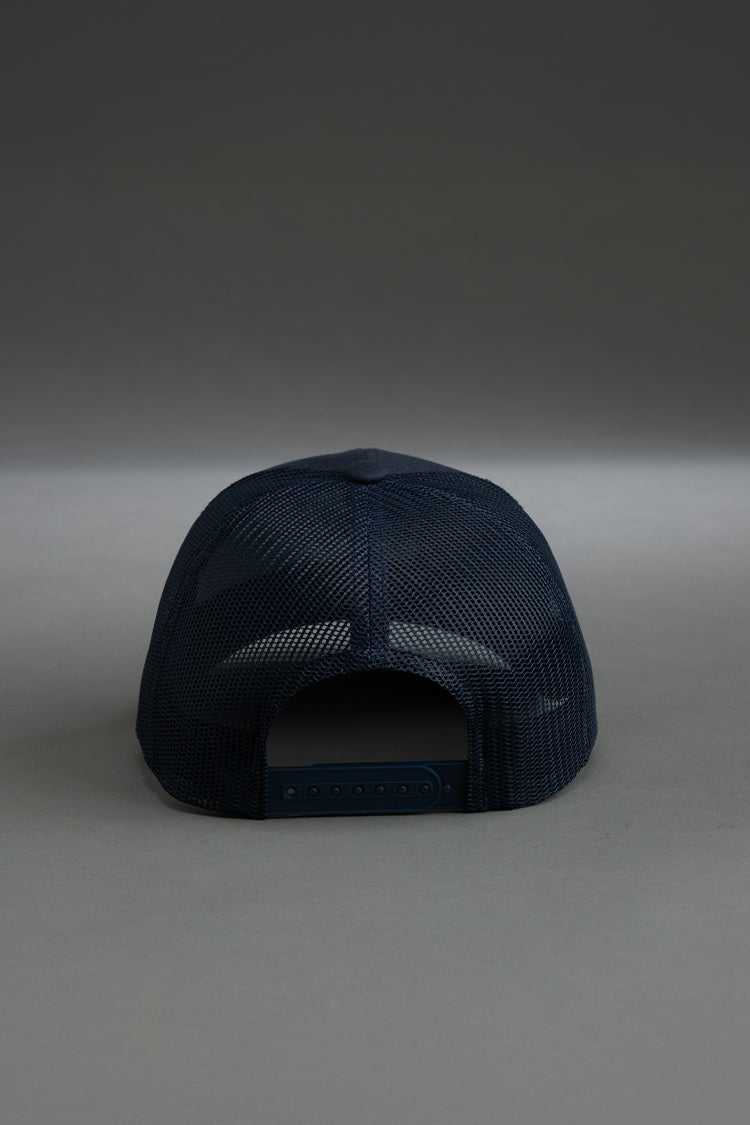 White Logo Trucker Cap on Navy