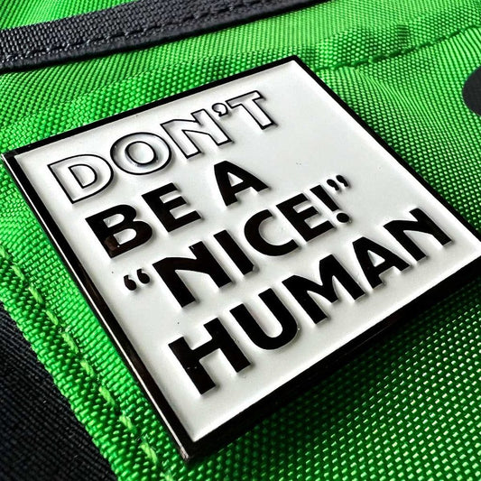 "Don't Be A 'NICE!' Human" Pin - Double Metal Backer