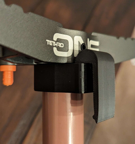 Tethrd One Stick Caddy for Saddle Hunting