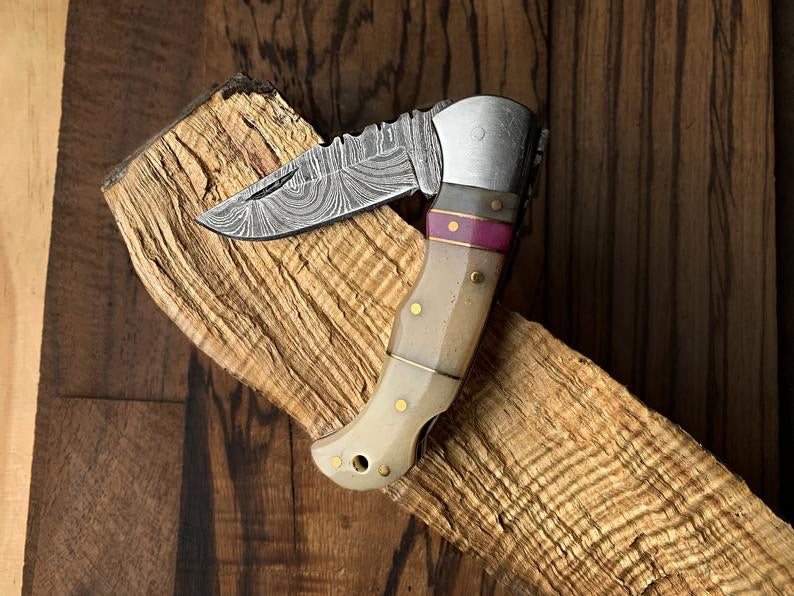 Best Damascus Steel Folding Pocket Knife with Bone and Color Wood Spacers Handle, 3 Inches Blade Length and Leather Case - For Sale by KBS Knives Store.