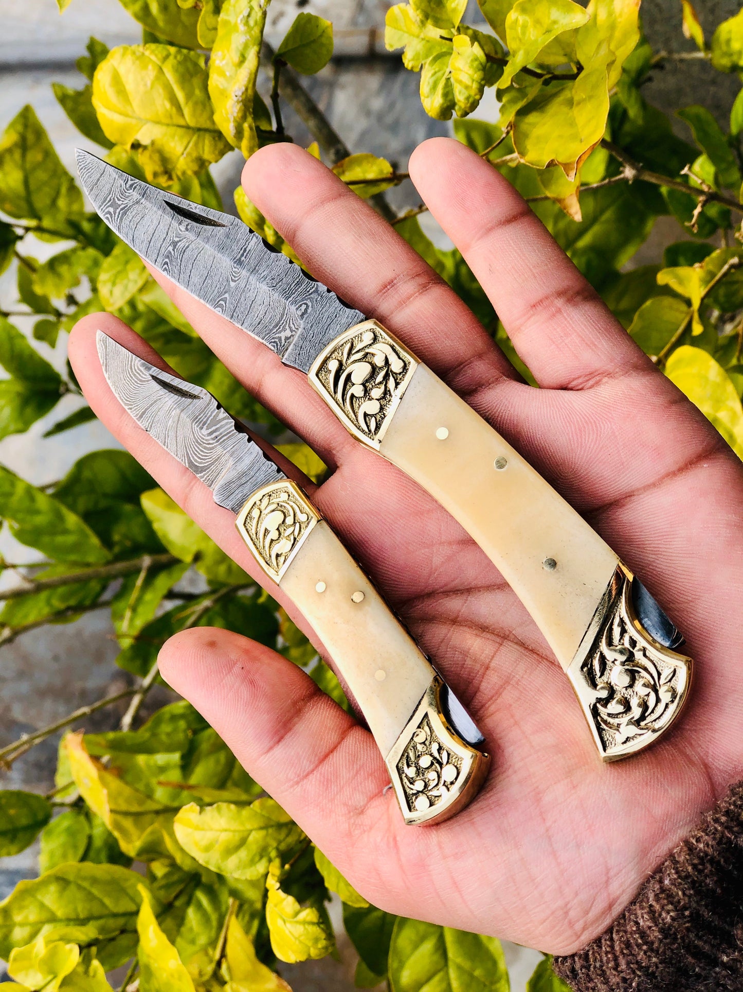 Pair of Custom Handmade Damascus Steel Folding Pocket Knives with Bone and Engraved Brass Bolsters Handle