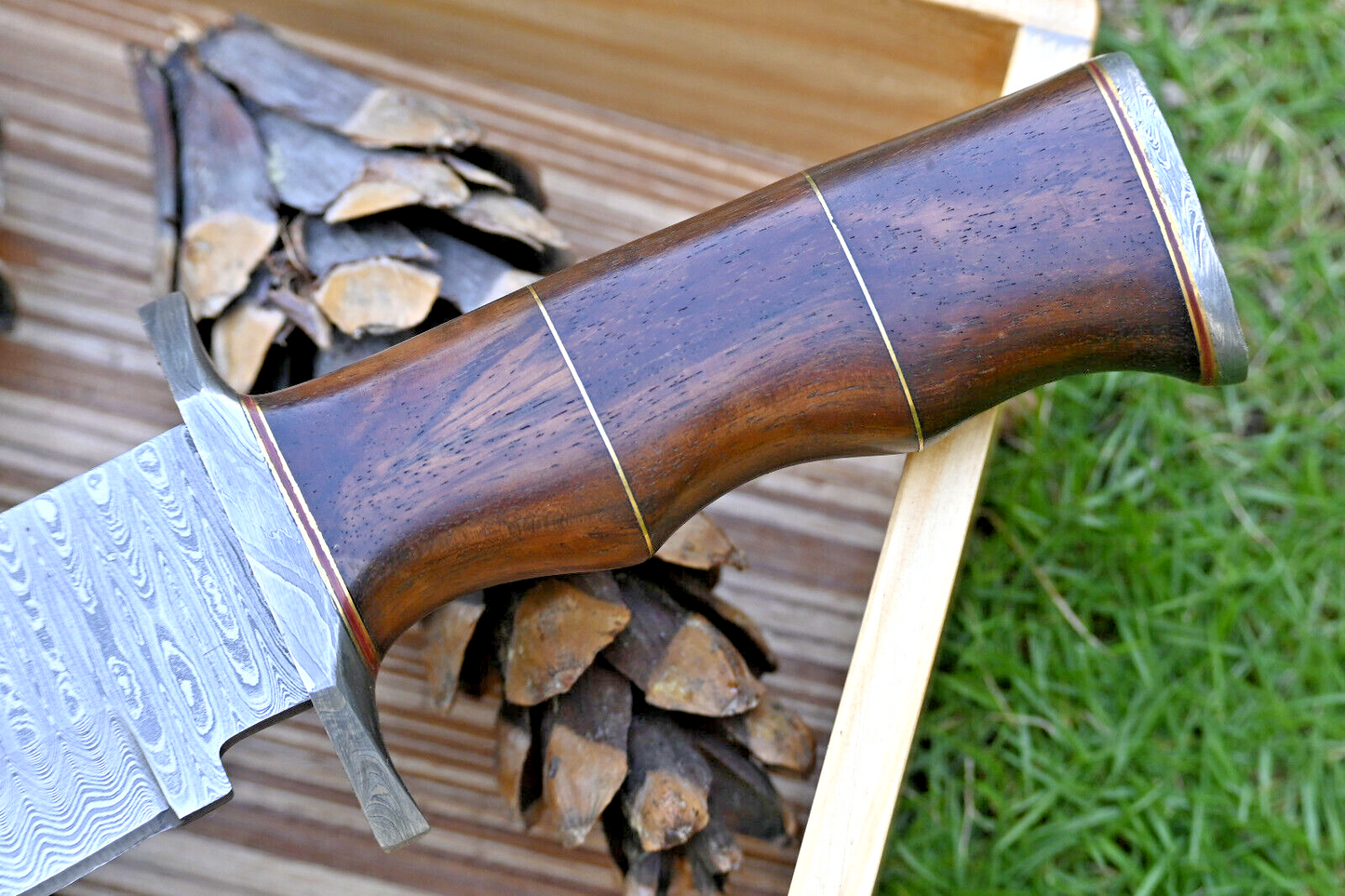 Wilderness Guardian: Hunting Bowie Knife with Damascus Steel Blade, Rosewood Handle, Brass Spacers, Damascus Guard, and Leather Sheath