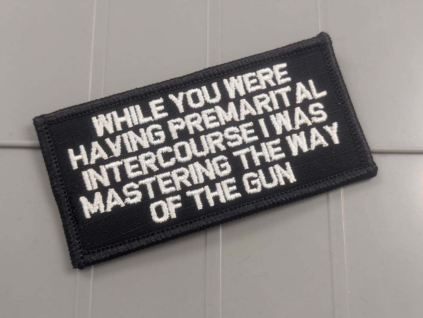 As Seen on Socials - While You Were Having Premarital Intercourse I Was Mastering The Way Of The Gun - 2x4 Patch - Black w/Silver