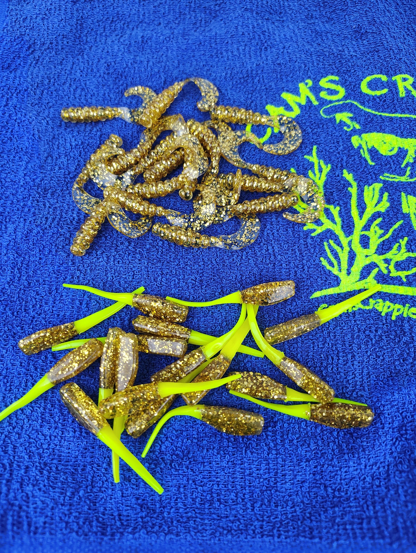 Cam's 2"(HOLOGRAM FLAKE) MR OCTOBER GOLD/GOLDFINGER 100pc (SPLIT SET) Curly Tail Crappie Soft Jigs [A Cam's Exclusive