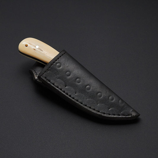 The Fieldmaster's Companion: 7.5-Inch Skinning Hunting Knife with Full Tang D2 Steel Blade, Bone Handle, and Steel Bolster