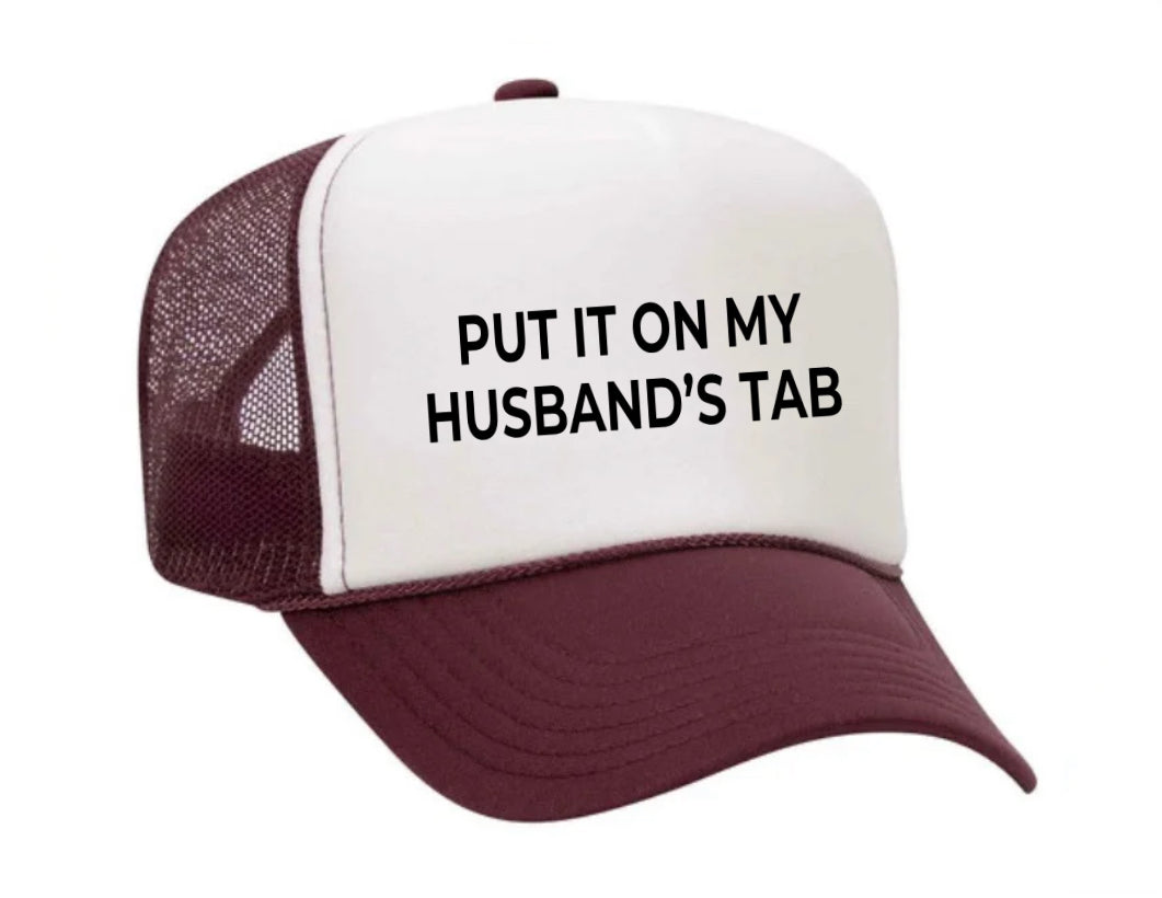 Put it on my husband’s tab Trucker Hat