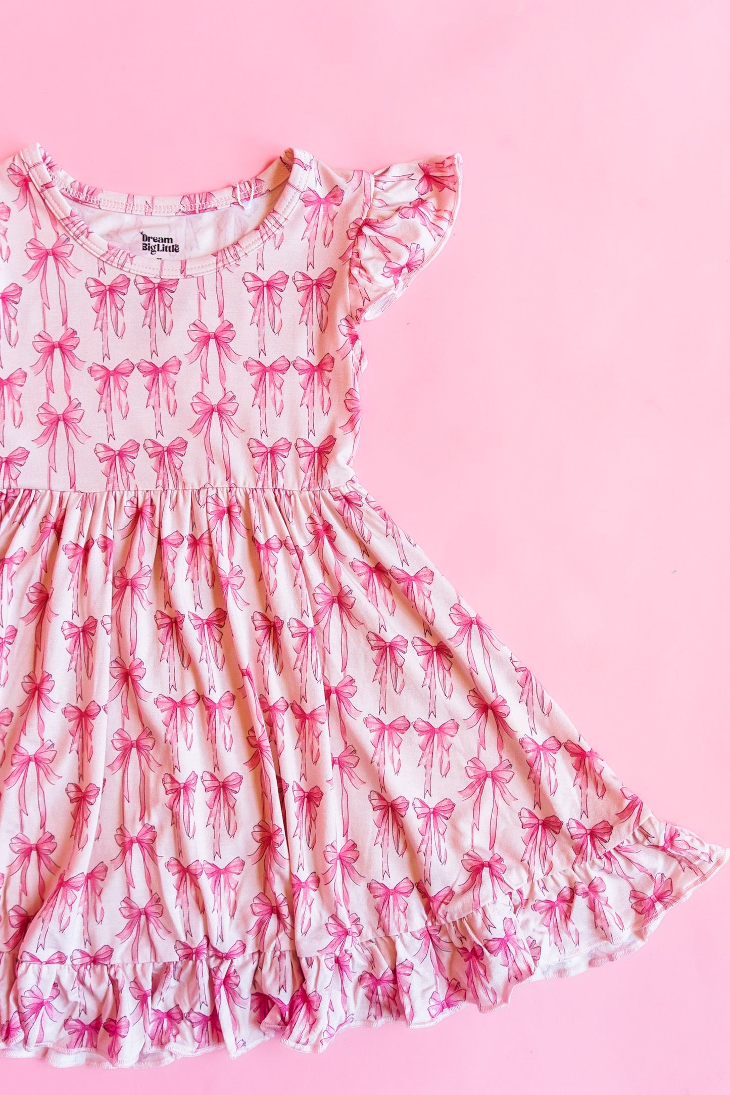 BOW CUTE DREAM RUFFLE DRESS