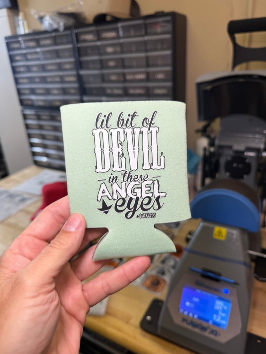 Lil Bit Of Devil in these Angel Eyes Koozie