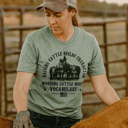 Working Cattle Builds Vocabulary Funny Rancher T-Shirt – Western Farm Life Graphic Tee – Heather Brown & Dusty Blue Unisex