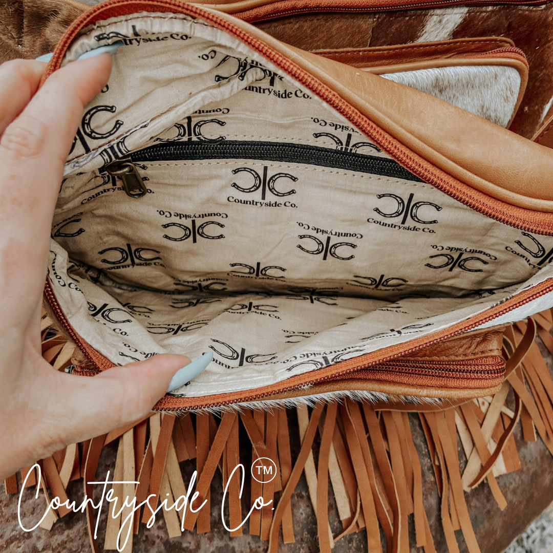 Addy Cowhide Sling Festival Bag