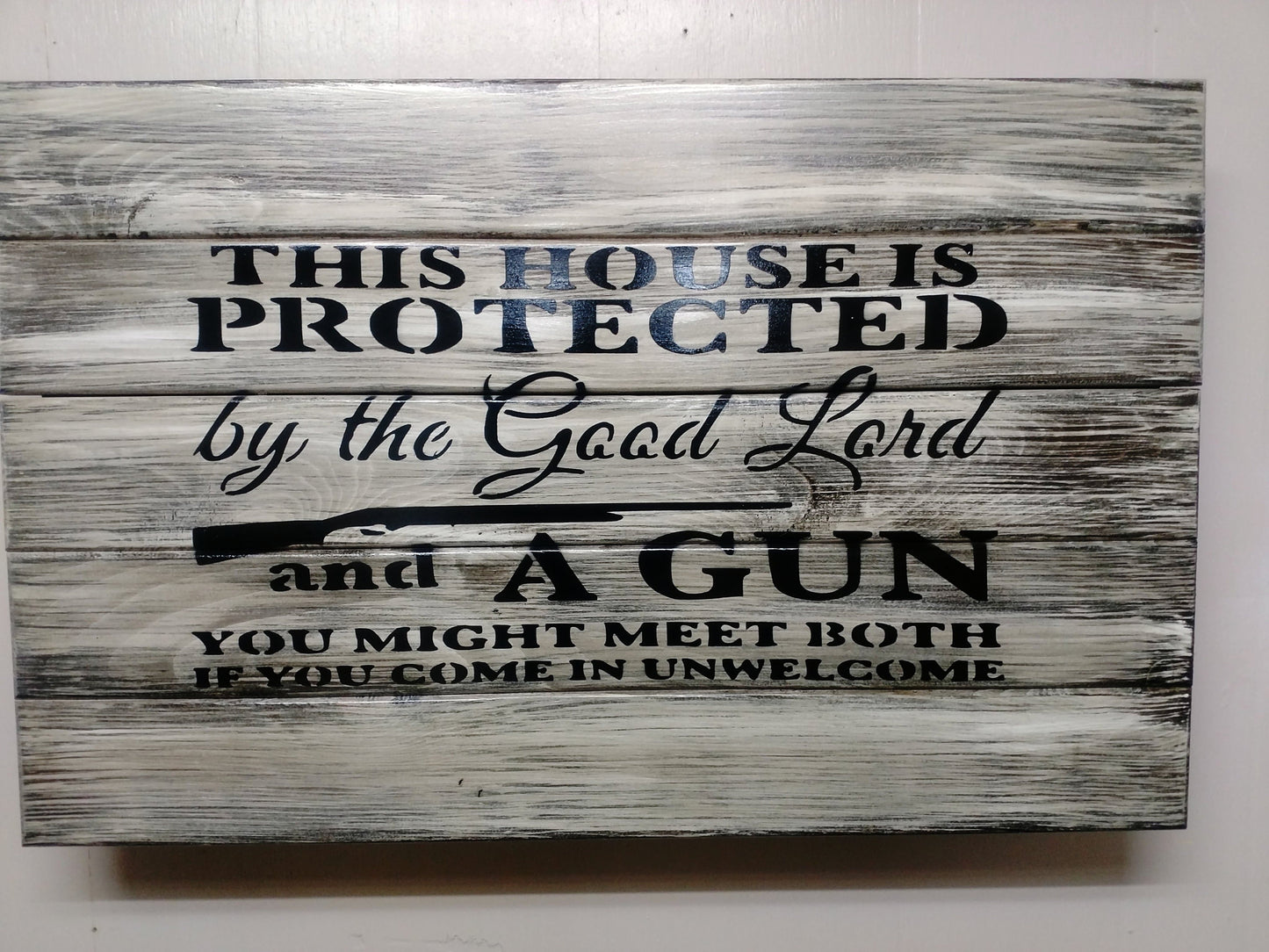 This House is Protected Hidden Gun Storage Sign