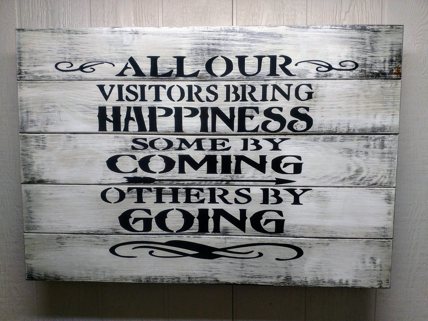 LARGE “VISITORS BRING HAPPINESS” GUN CONCEALMENT WALL ART
