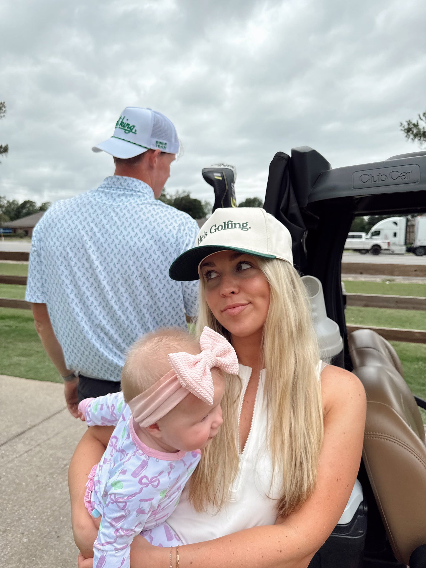 He's Golfing - Green Vintage Trucker Hat