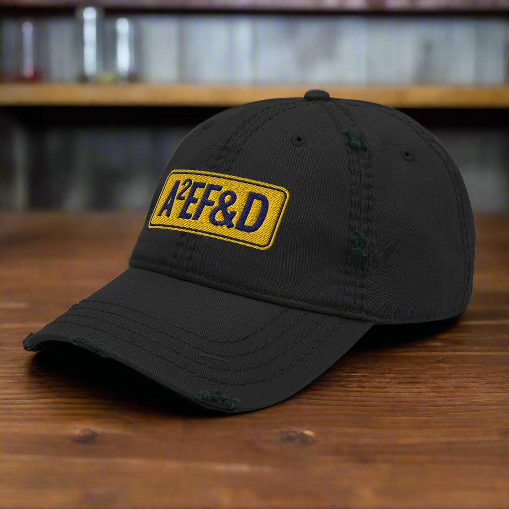 Against All Enemies Distressed Dad Hat (Navy/Gold)