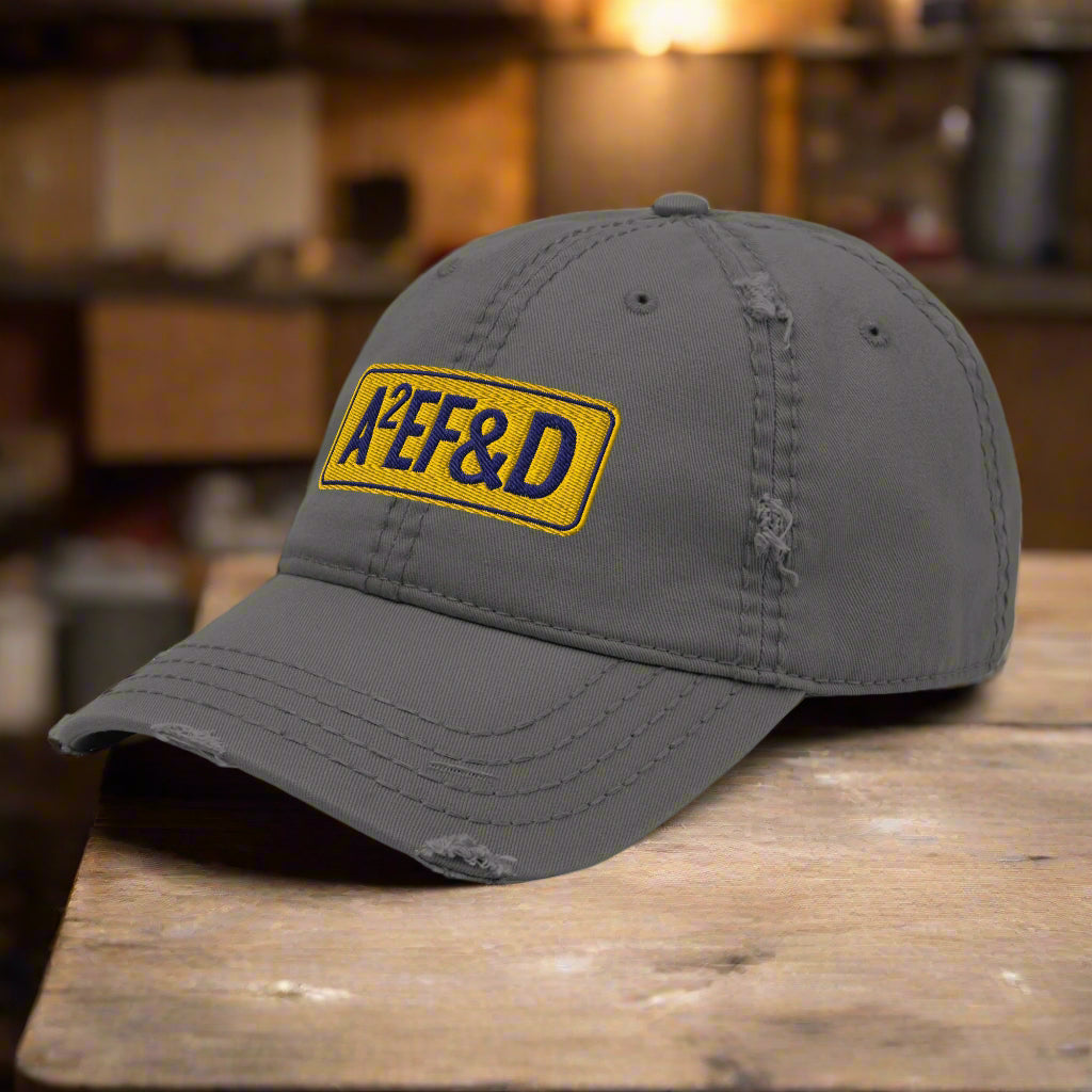 Against All Enemies Distressed Dad Hat (Navy/Gold)