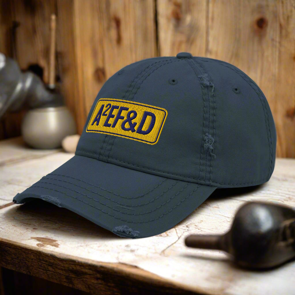 Against All Enemies Distressed Dad Hat (Navy/Gold)