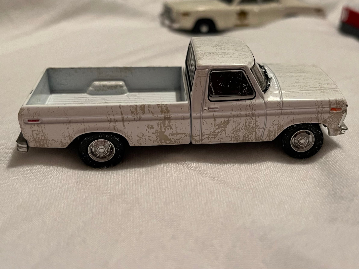 1:64 1973 Ford F-100 White Weathered (Hobby Exclusive) PREORDER Aug