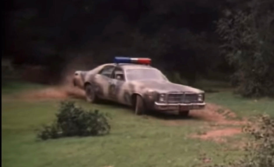 1:64 CAMOUFLAGE 1978 DODGE MONACO HAZZARD COUNTY SHERIFF *RETIRED*