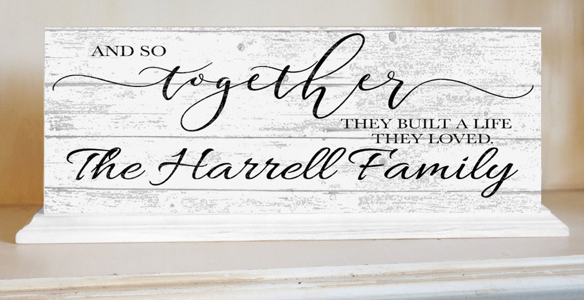 So Together They Built A Life They Loved Sign With Couple's Names