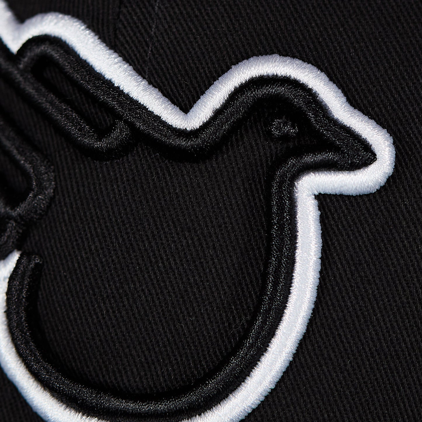 The Snowbird Black and White Flat Bill